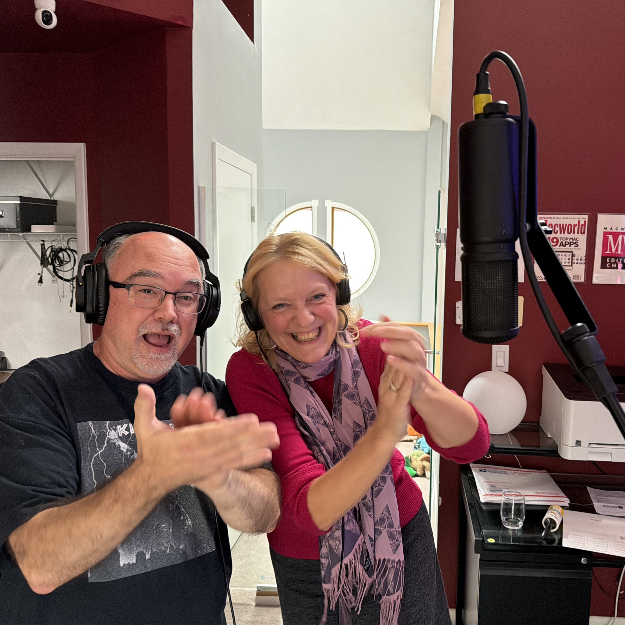 Two performers celebrating a vocal recording session